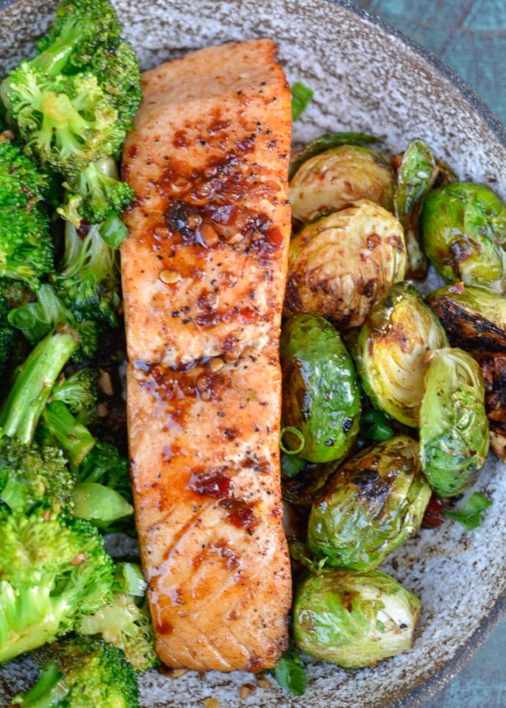 This Asian Salmon recipe is an easy and healthy weeknight dinner ready in under 20 minutes! This simple salmon dish is low carb and keto-friendly!