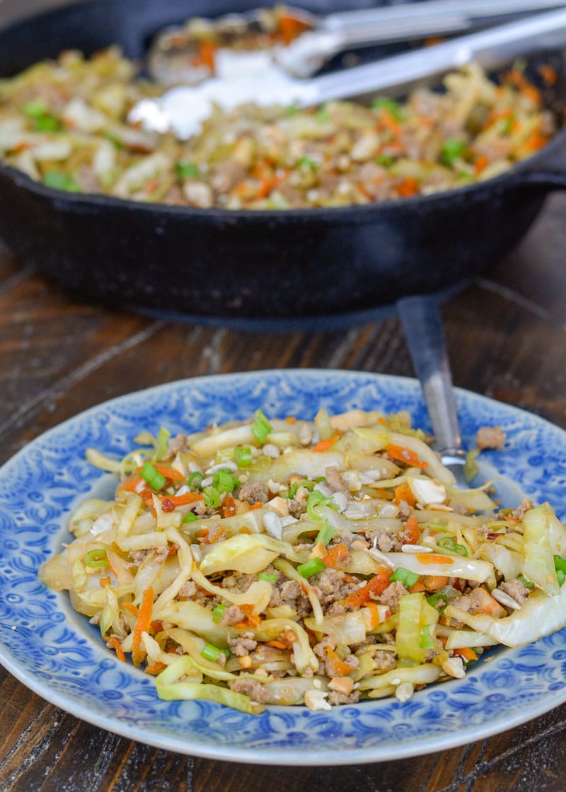 Egg Roll in a Bowl is an easy, healthy dinner that is ready in under 20 minutes! This easy pork stir fry recipe is loaded with meat, vegetables and a sesame sauce.