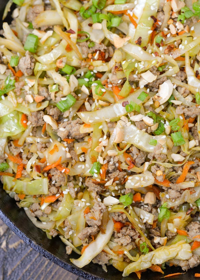 Egg Roll in a Bowl is an easy, healthy dinner that is ready in under 20 minutes! This easy pork stir fry recipe is loaded with meat, vegetables and a sesame sauce.