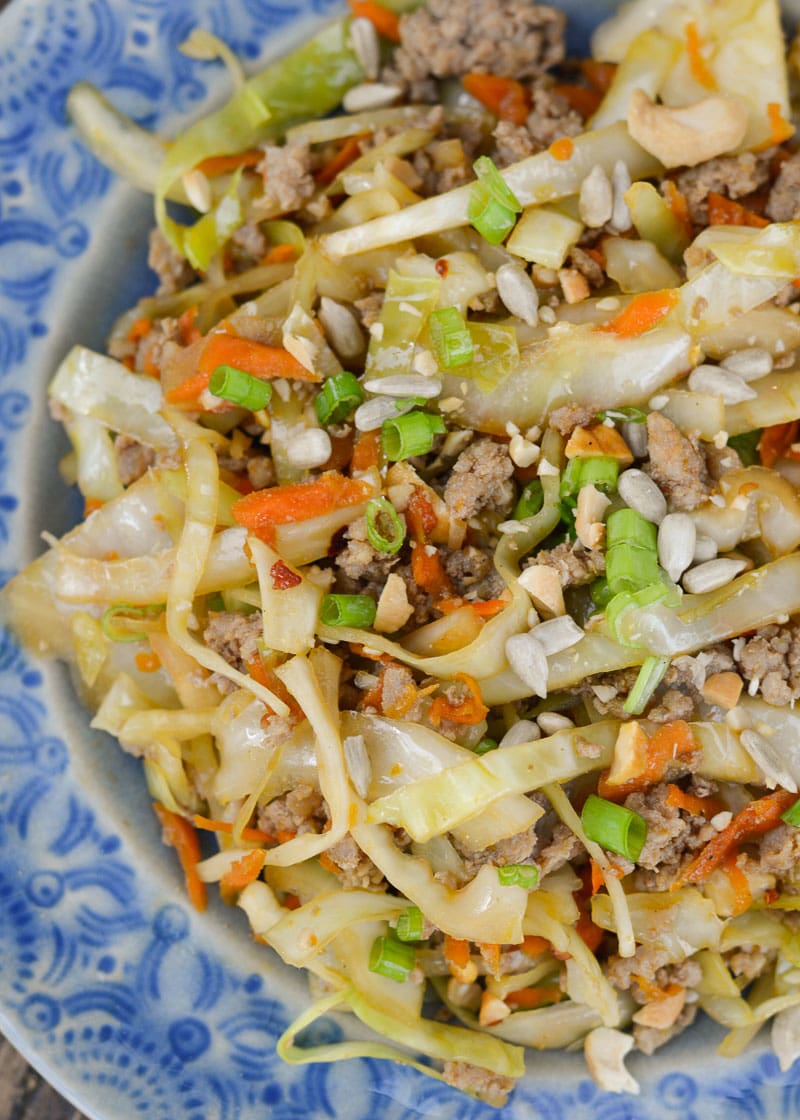Egg Roll in a Bowl is an easy, healthy dinner that is ready in under 20 minutes! This easy pork stir fry recipe is loaded with meat, vegetables and a sesame sauce.